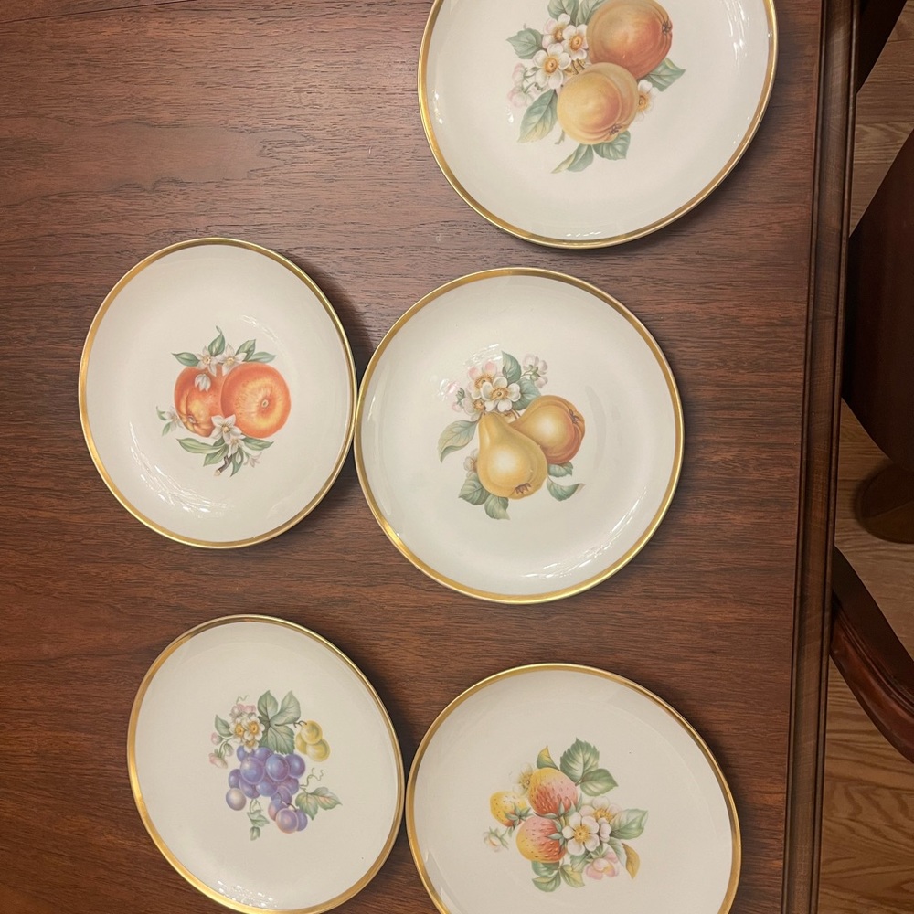 Fruit painted plate with gilt trim by Hutchenruether.